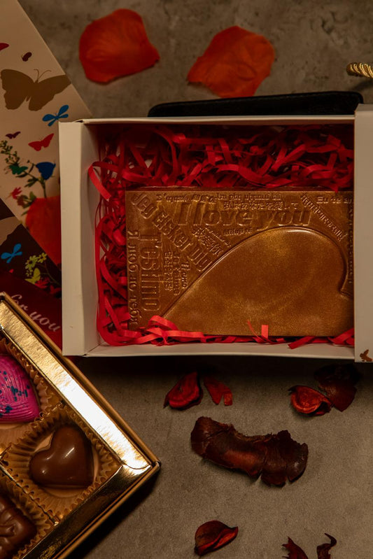 Premium Chocolate gifts inside a decorative box with red ribbons, perfect for Valentine's celebrations.