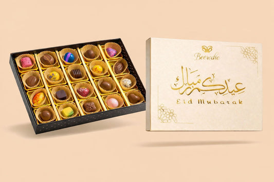 Eid Chocolate gifts - Eid Mubarak Box featuring a mix of pralines and colorful bonbons in rich flavors.