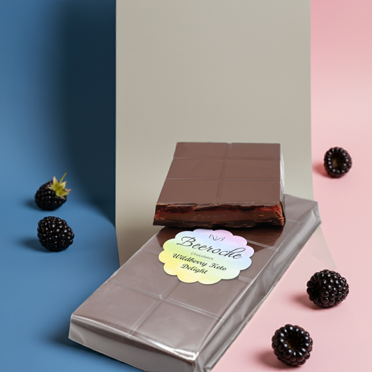 Keto Chocolate Wildberry Delight bar with blackberry jam, creamy texture, and smooth ganache, styled against colorful backgrounds.